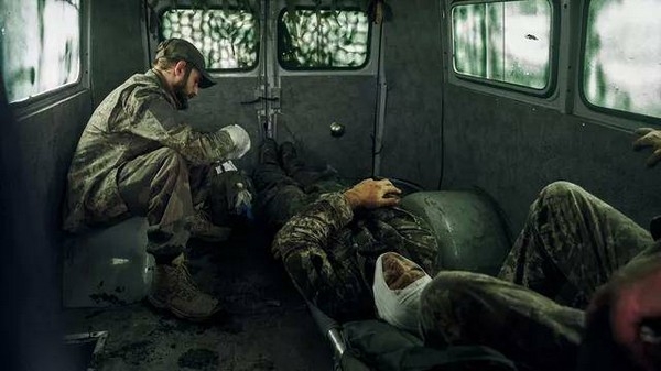 © AP Photo / Kostiantyn Liberov Раненые украинские военные. Архивное фото